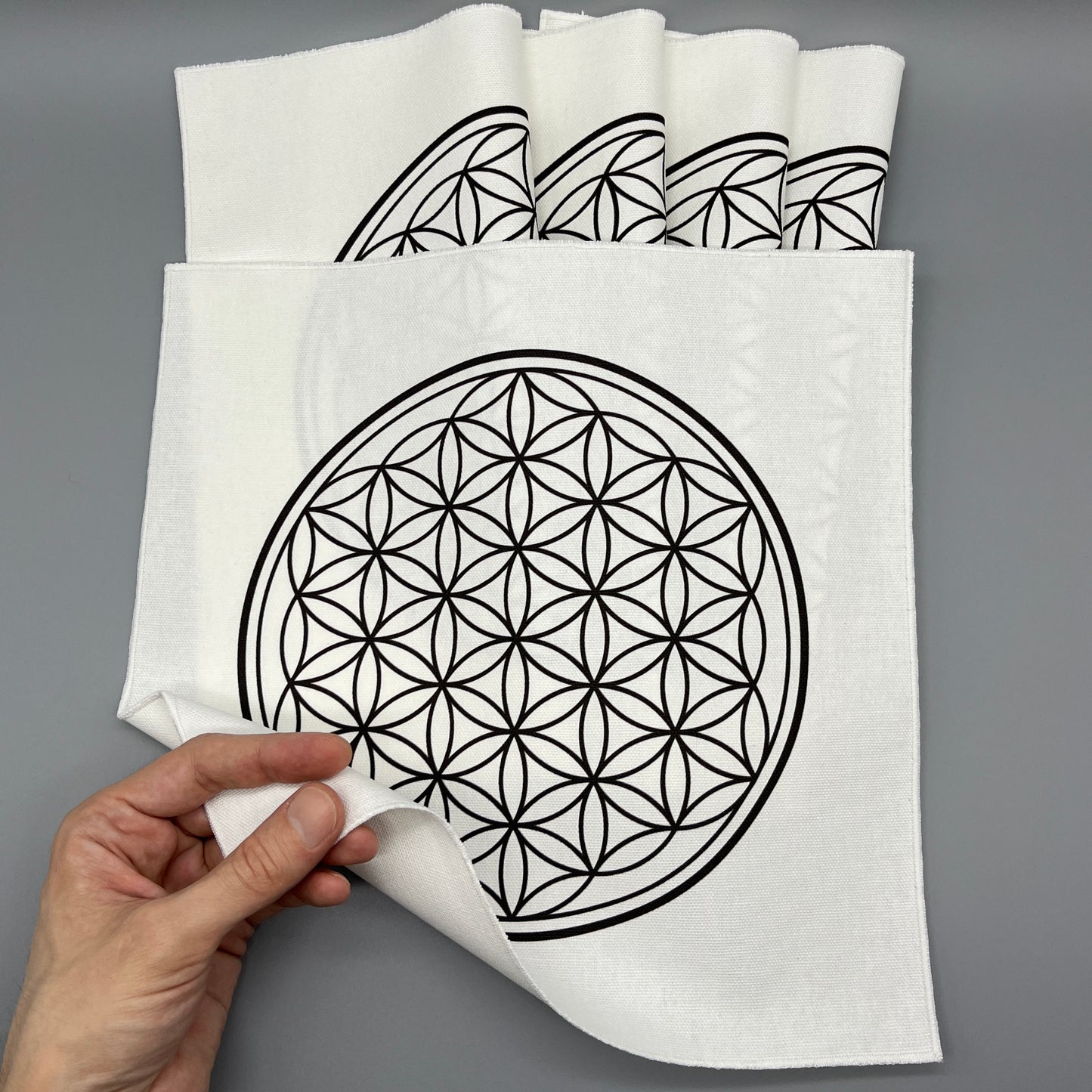 12 Inch Flower of Life Crystal Grid Cloth Showing Fabric Thickness in Hand