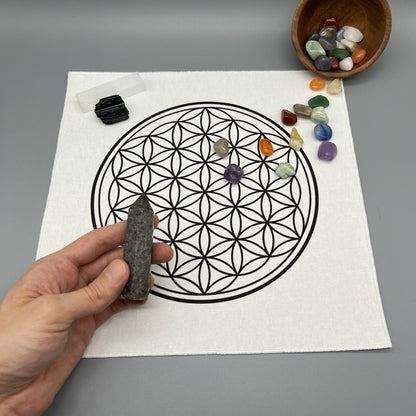 12 Inch Flower of Life Crystal Grid Cloth with Crystals on it and a Crystal Tower being Placed