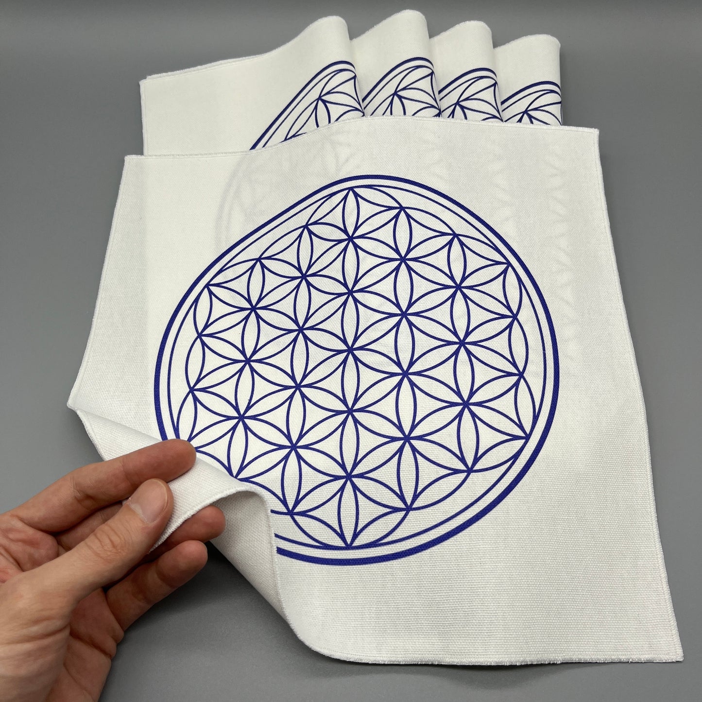 12 Inch Flower of Life Crystal Grid Cloth Showing Fabric Thickness in Hand